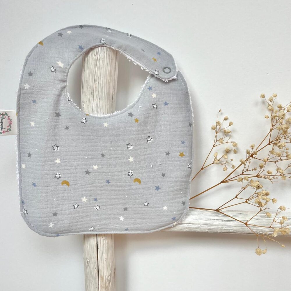 Ir a página babero-theo-mini-stars-gris