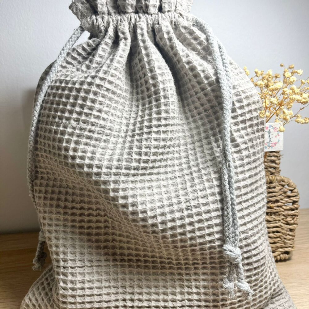 Ir a página bolsa-jimena-nido-de-abeja-gris-pastel